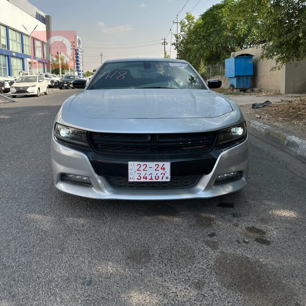 دۆج چارجەر
